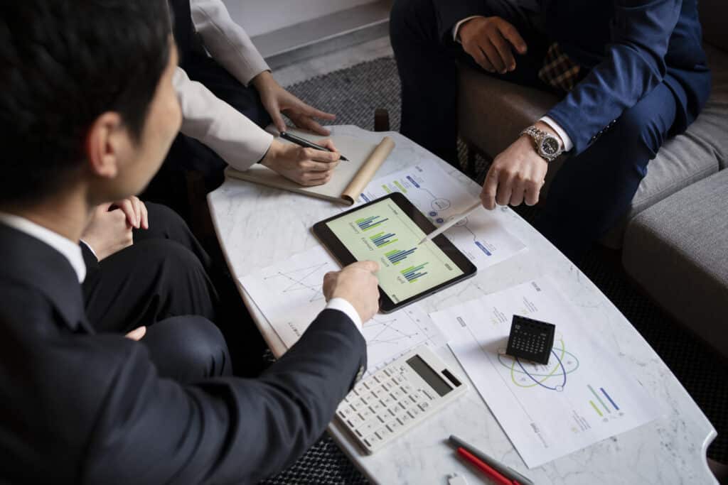 Business People Using iPad